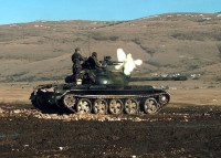 HVO_Army_T-55_Glamoc_firing_MG.jpg