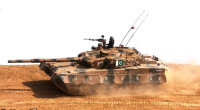 Al-Khalid MBT being demonstrated during a military equipment exhibition in Pakistan.jpg