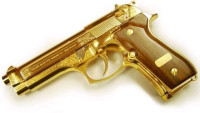 9313027-golden-gun.jpg