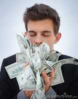 closeup-young-business-man-holding-money-6802748.jpg