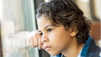 sad-child-looks-thru-window-600-x-340.jpg