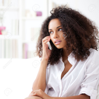 19590679-Beautiful-African-woman-making-a-phone-ca.jpg