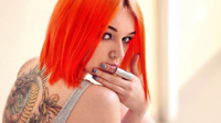 _Girl_with_orange_hair_and_a_tattoo_on_her_back_10.jpg