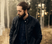 Man-Bun-hairstyle-for-men-with-full-beard.jpg