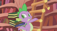 Spike_carrying_books_up_the_ladder_S1E10.png